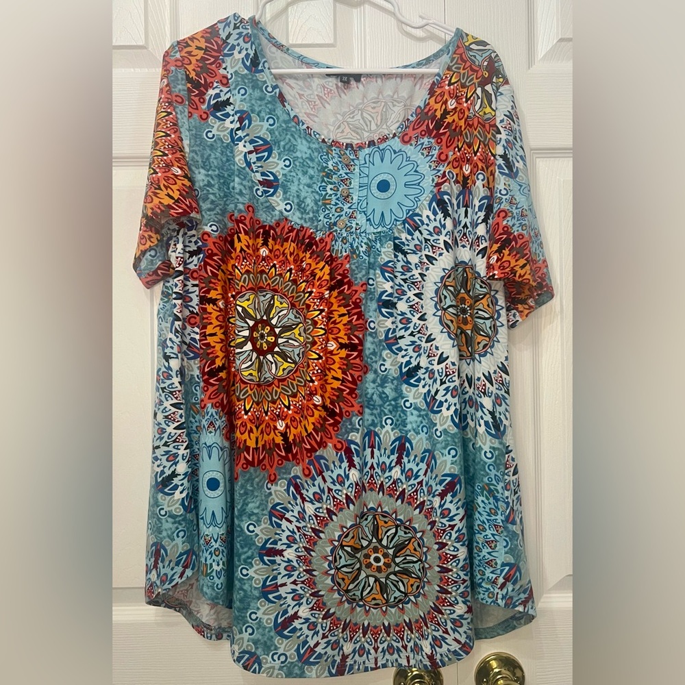Bohemian or Boho Chic with a prominent mandala and floral pattern. 3x